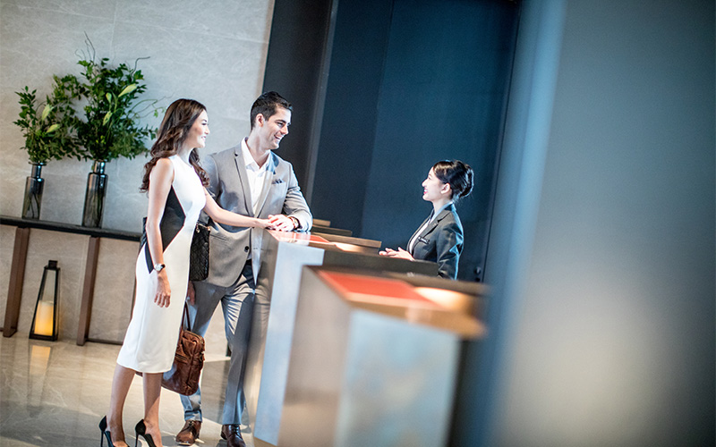 Guests checking in at InterContinental Singapore Robertson Quay.